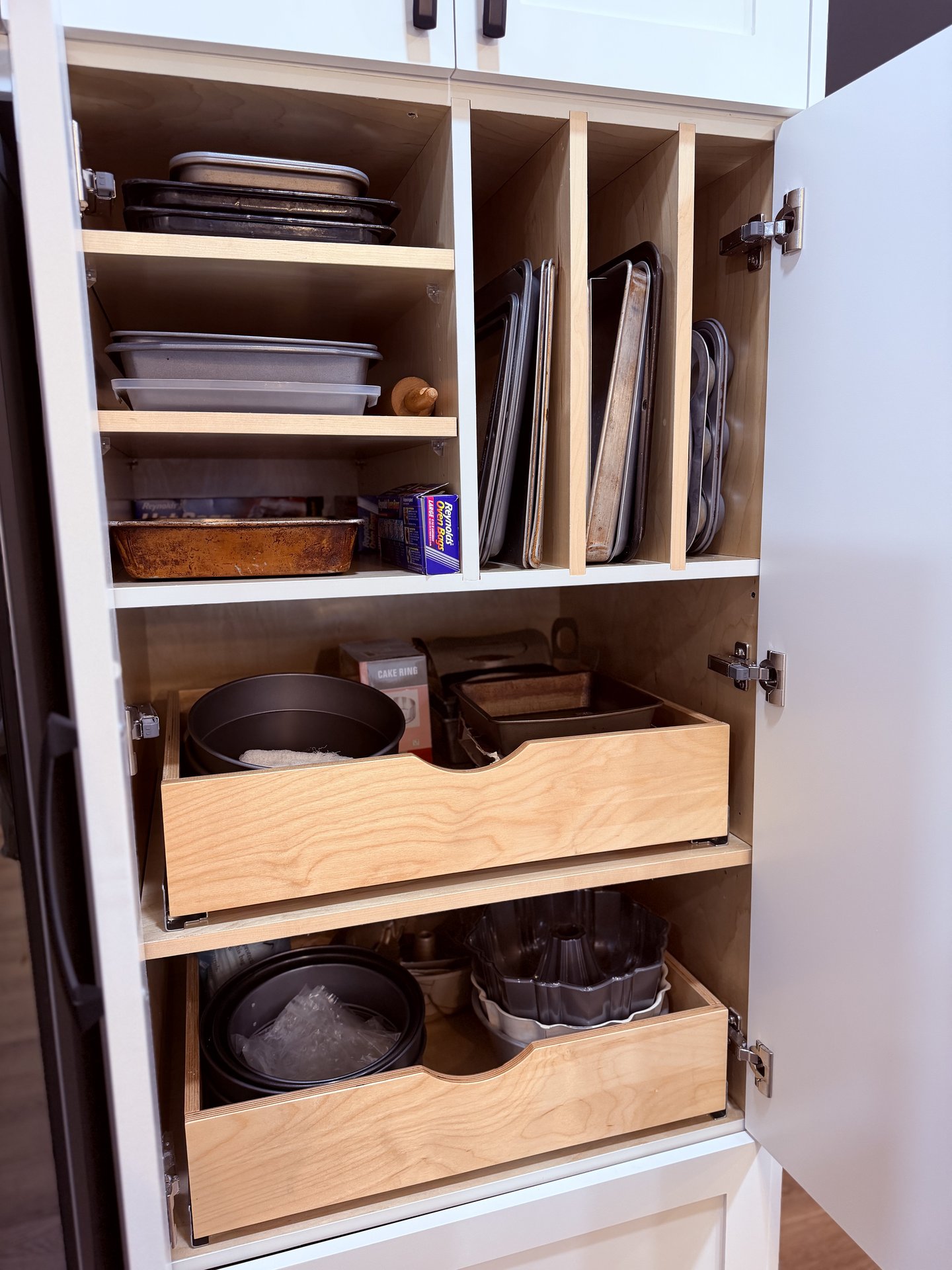Pullout trays in a pantry cabinet